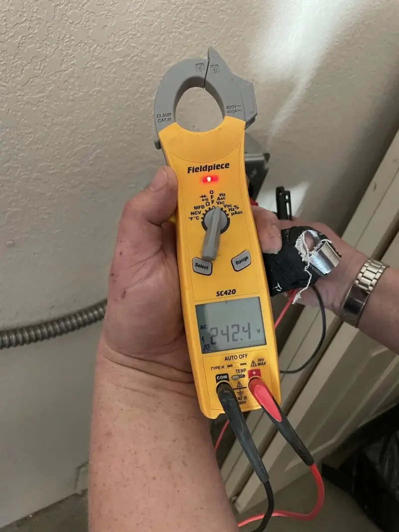 Voltage testing with clamp meter during Aluminum Wiring Replacement in Mount Healthy